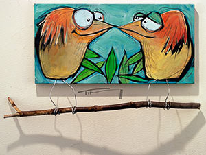 beak to beak on branch