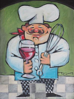 chef with wine and wisk